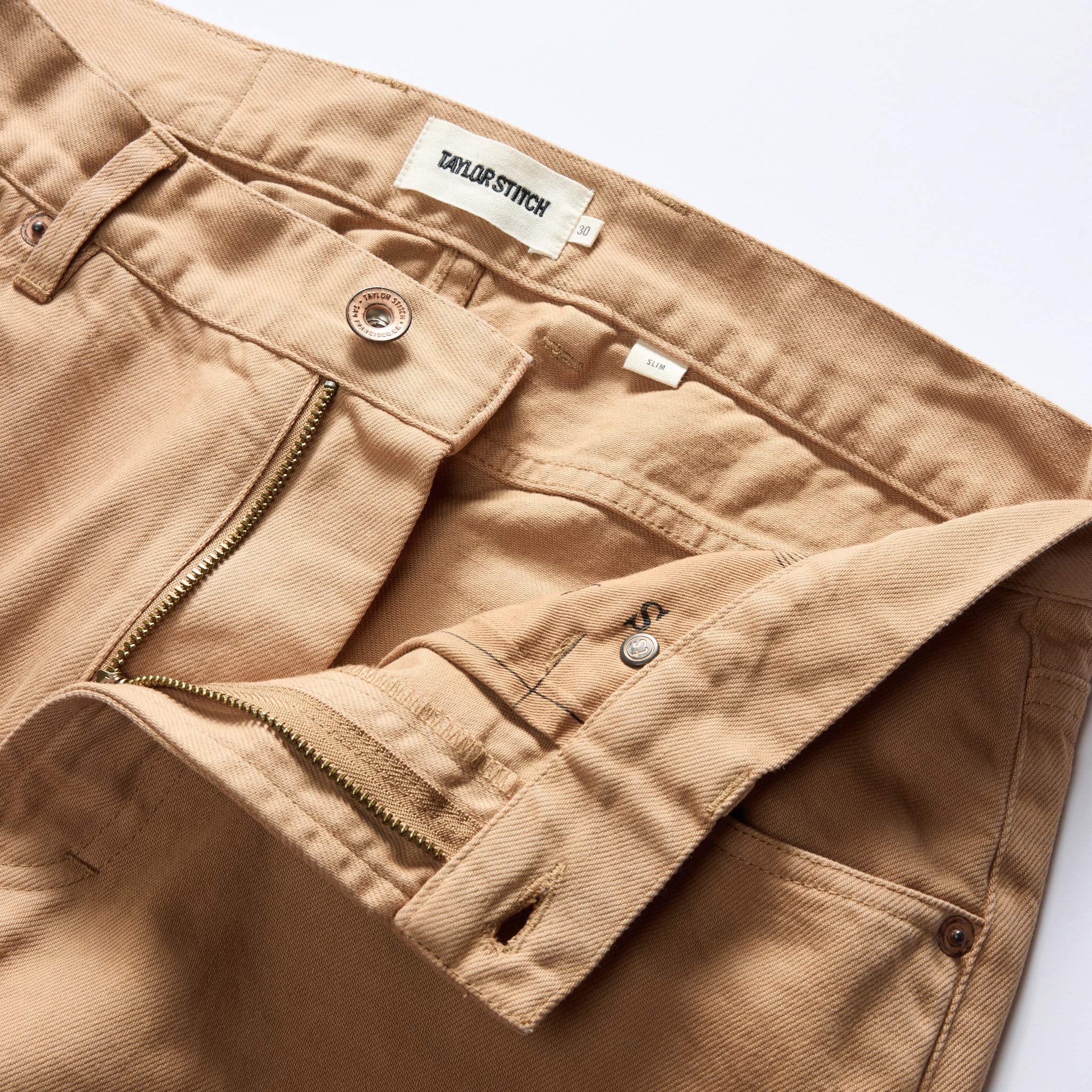 The Slim All Day Pant in Tobacco Selvage Denim